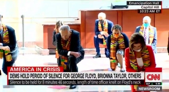 It's a Cult: Pelosi, Schumer Don African Scarves, Kneel Down For